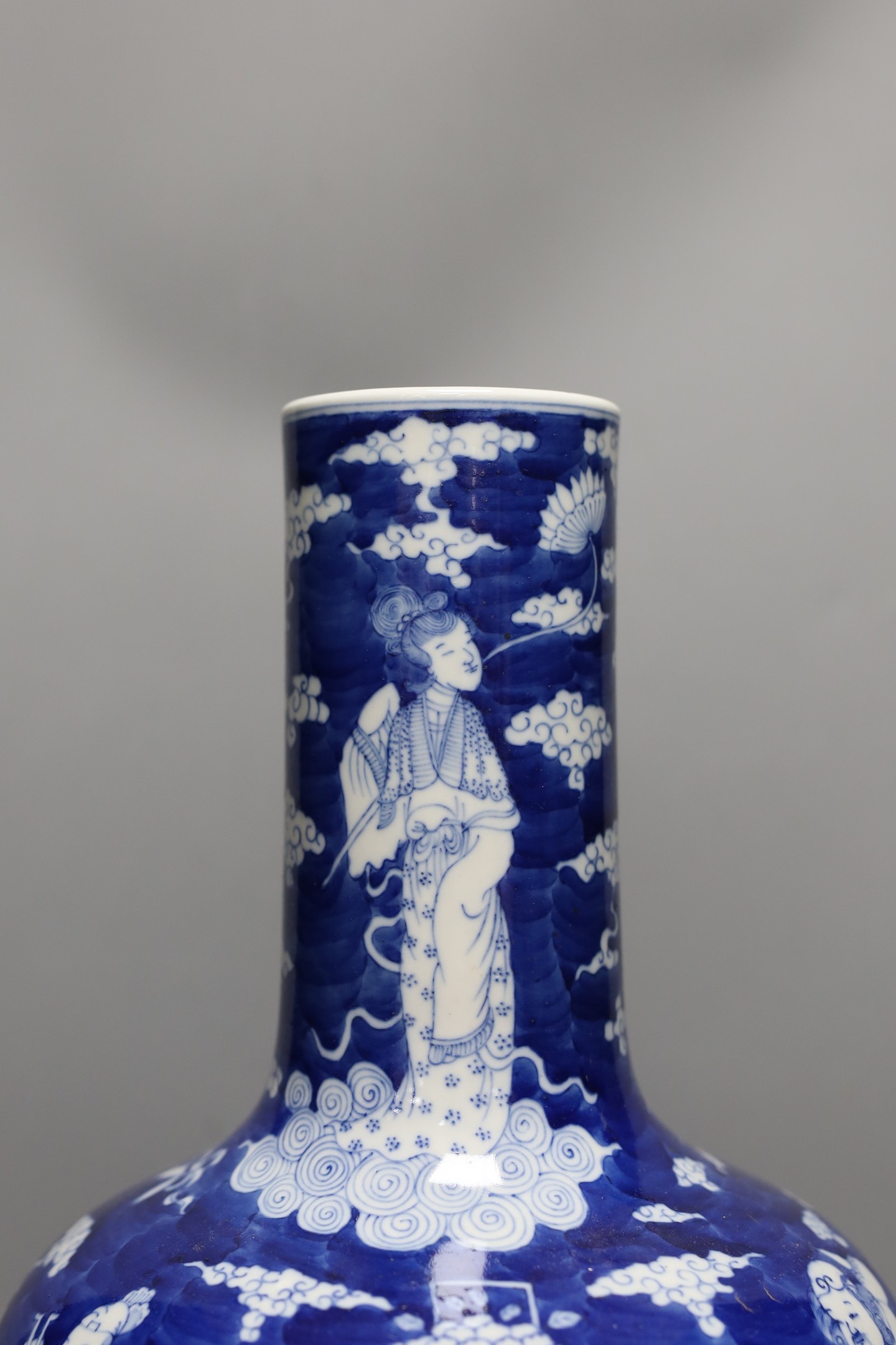 A Chinese blue and white figural vase on hardwood stand, 40cm total height